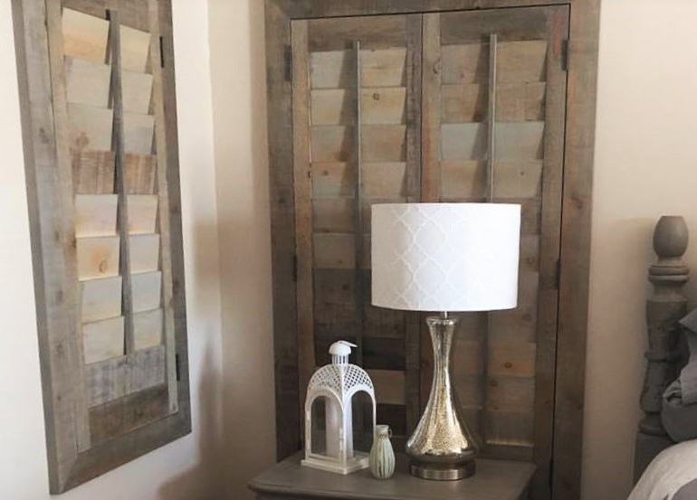 Sacramento bedroom with recycled wood shutters.